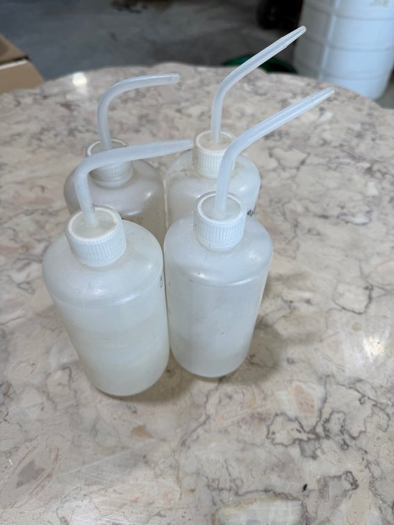 Squeeze dropper water bottles with nursery pots (see all photos)
