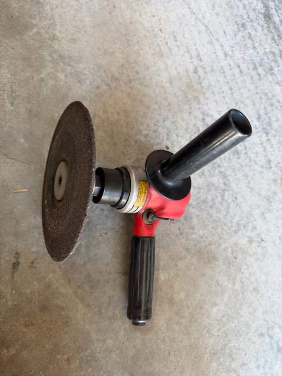 Air powered angle grinder