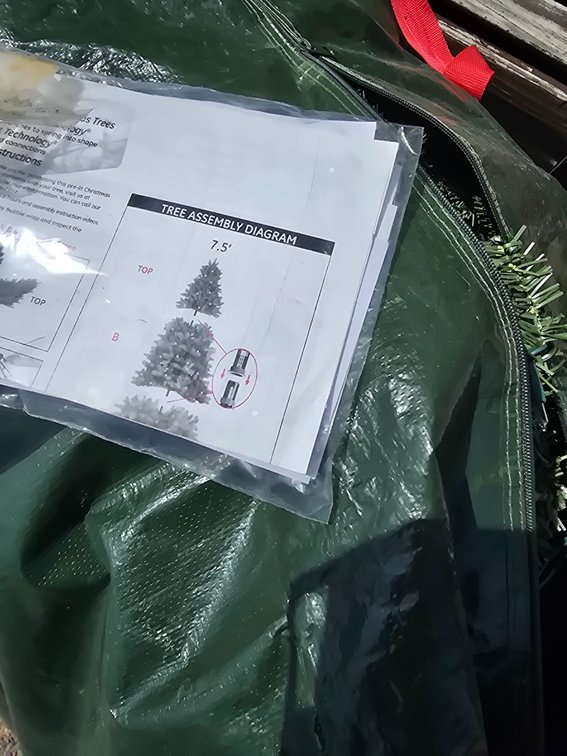 7.5 lighted Christmas tree, in Rubbermaid tree bag , 2 stands