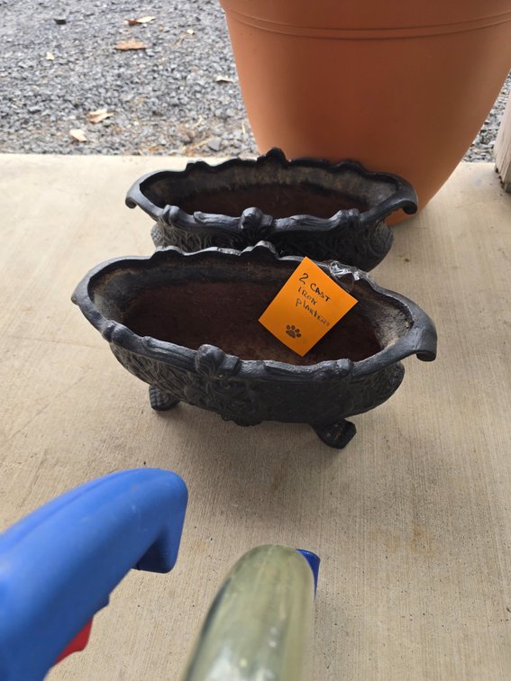 Two cast iron planters