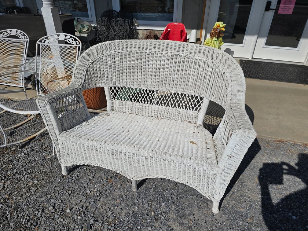 White wicker sofa pretty good shape