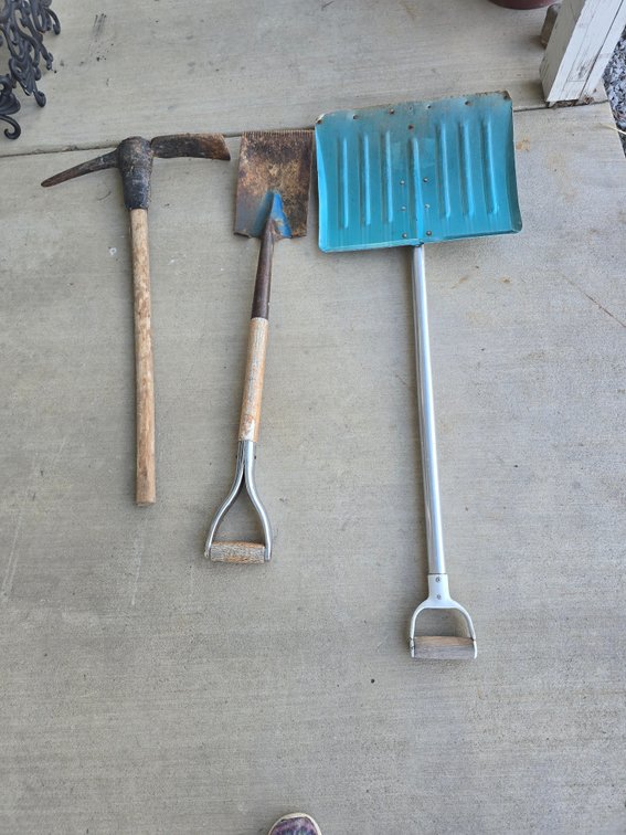 Metal snow shovel,  edges shovel. Pick ax