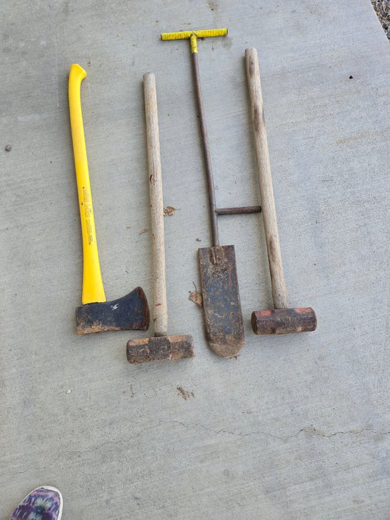 Ax with fiberglass handle,  sledge hammers, tree planter