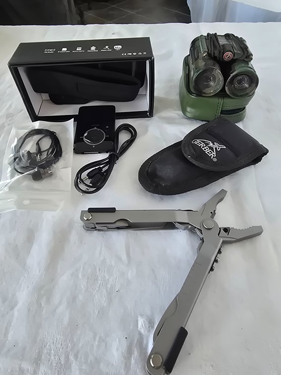 Personal radio, fishing pliers, binoculars  with case