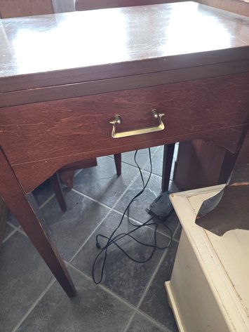Image for 1970 Kenmore sewing machine either attachments in cabinet