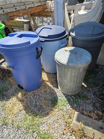 Image for Four like new trash cans with lids