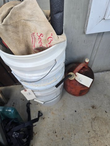 Image for Seed sower, buckets, and gas can
