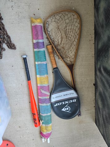 Image for Porch umbrella, tee ball bat. The cross and tennis