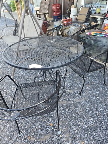 Image for Black rod iron table with four black barrel chairs
