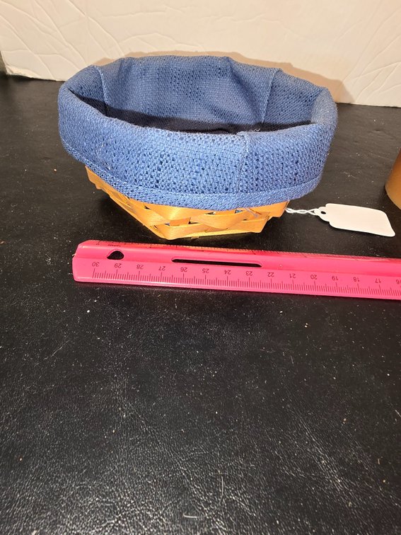 Longaberger basket with cloth liner, pottery candle plate and Longaberger candle