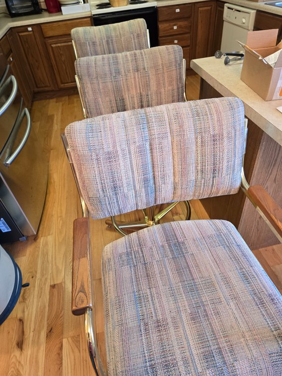 3 swivel based bar chairs