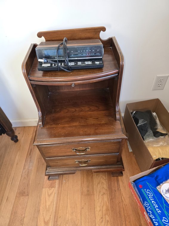 Bedside table with alarm clock radio