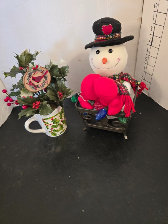 Holiday decor and box of mugs