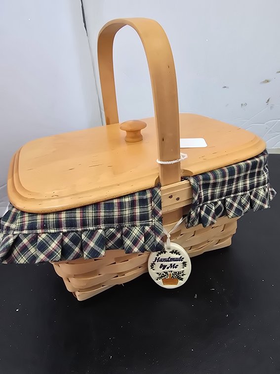 Longaberger basket,  says handmade by Phyllis Moore,
