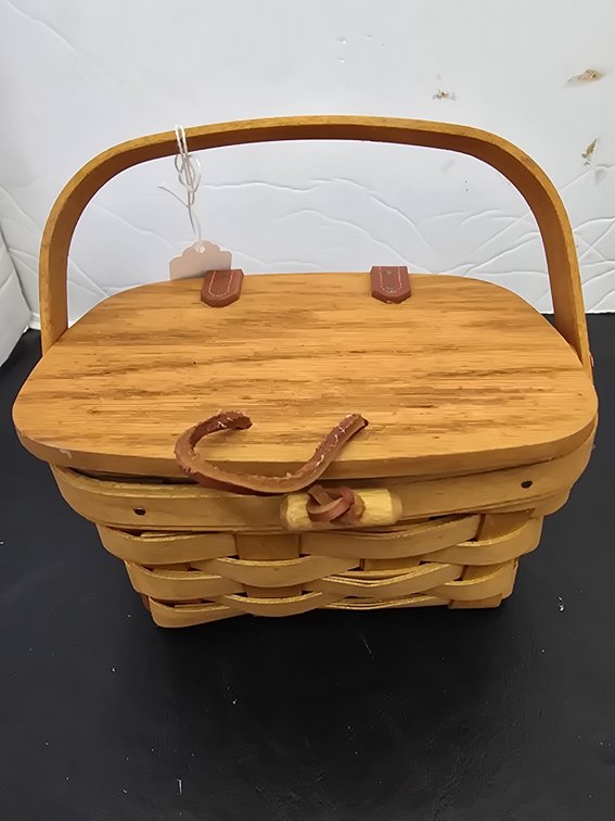 Longaberger basket with leather straps