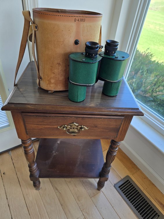 Sm. Side table with binocular and case