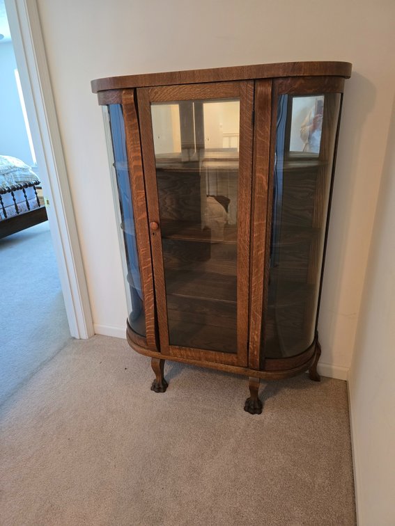 Bow front china press, Tiger Oak,  with claw feet