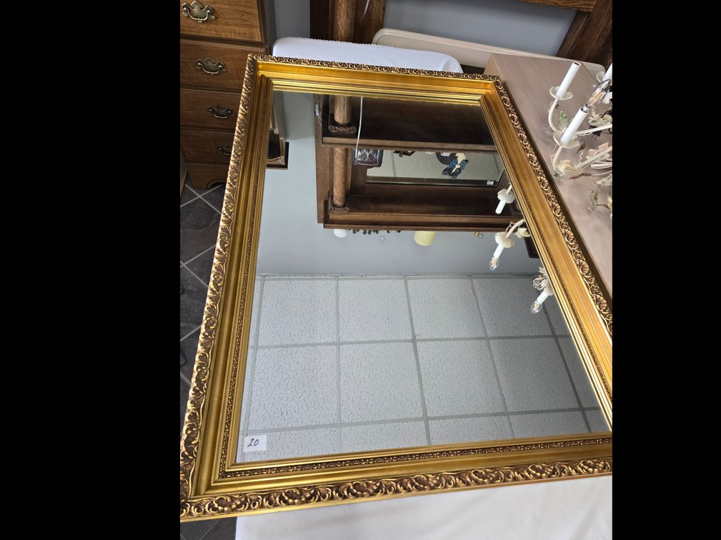 Very large gold painted wall mirror.