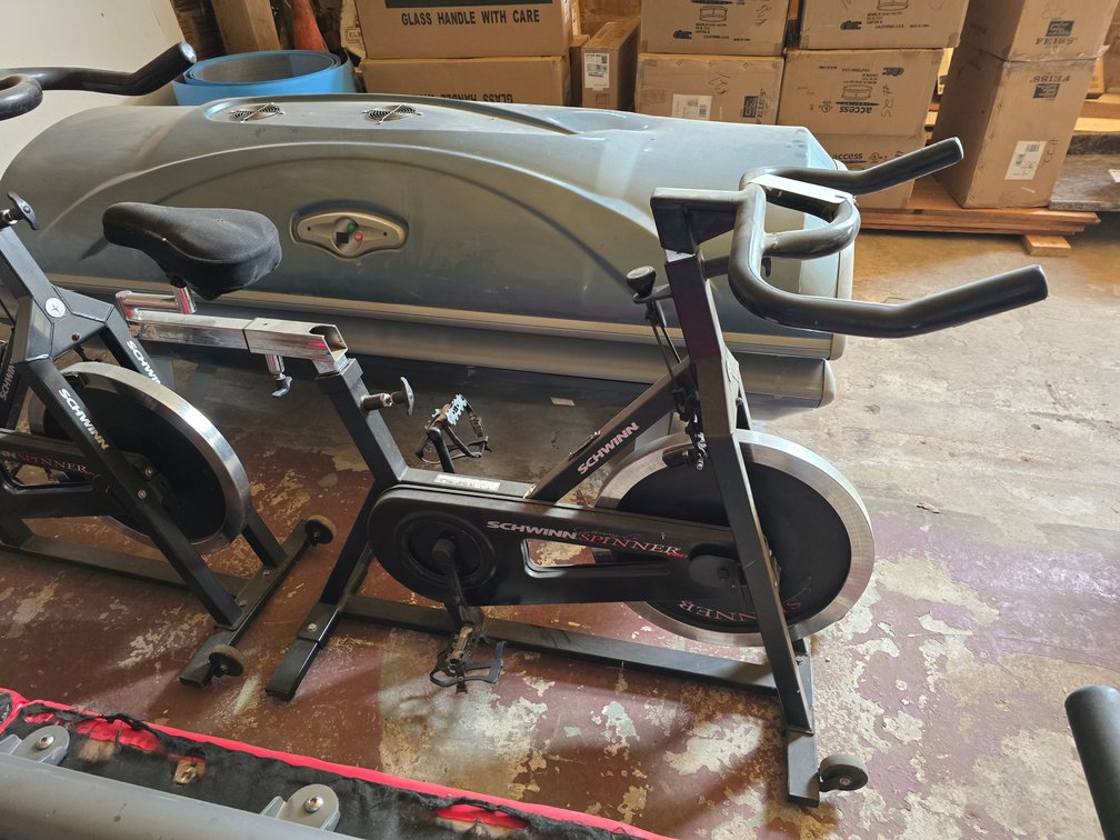 TWO SCHWINN SPINNER BIKES