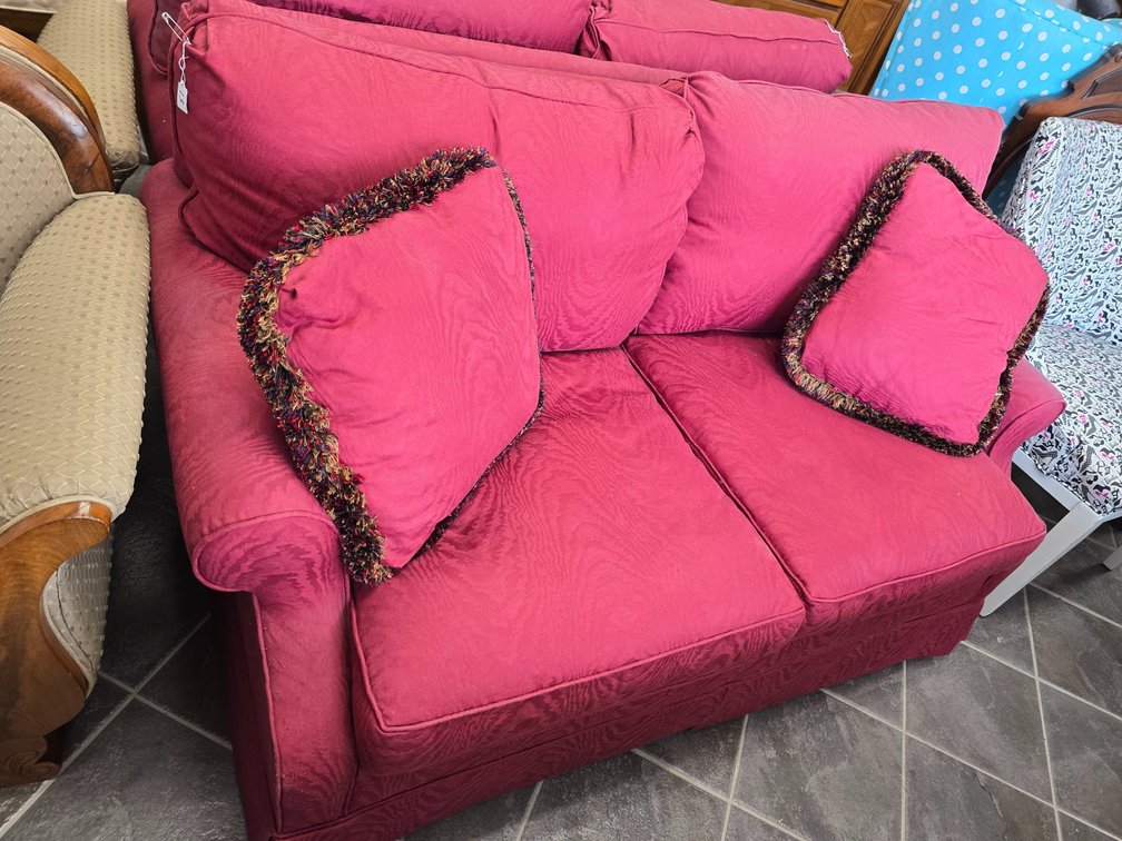 Upholstered sofa excellent condition in burgundy fabric