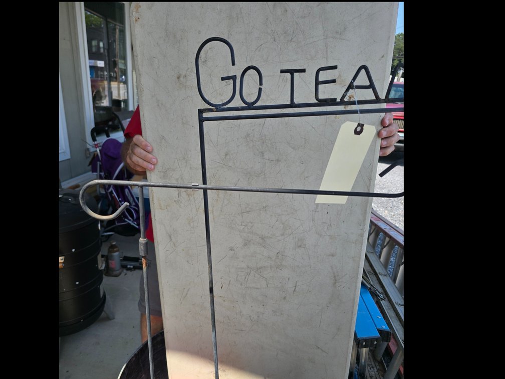 Small flagpoles one says "go team"