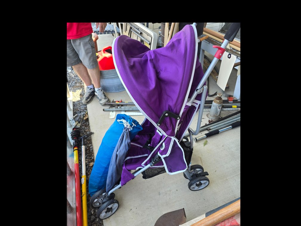 Baby buggy and tent in pack