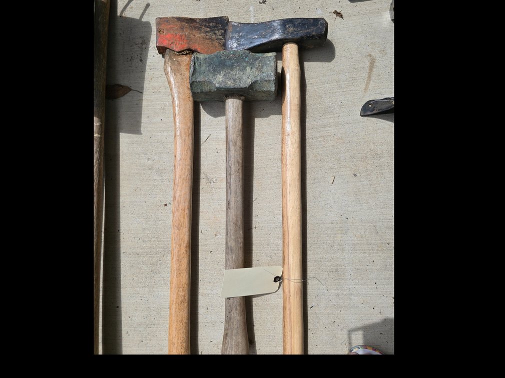 Solid brass, twenty pound hammer , ax and splitting maul