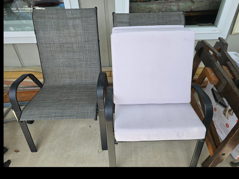 Two very nice outdoor chairs with cushions