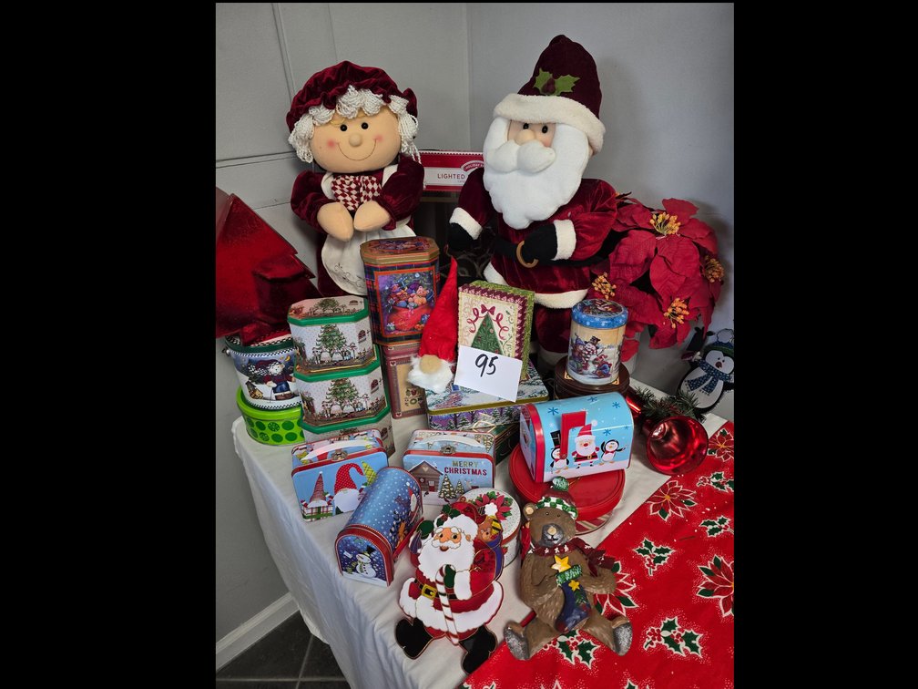 Mister and missus santa claus , lighted bells and lots of christmas tins 