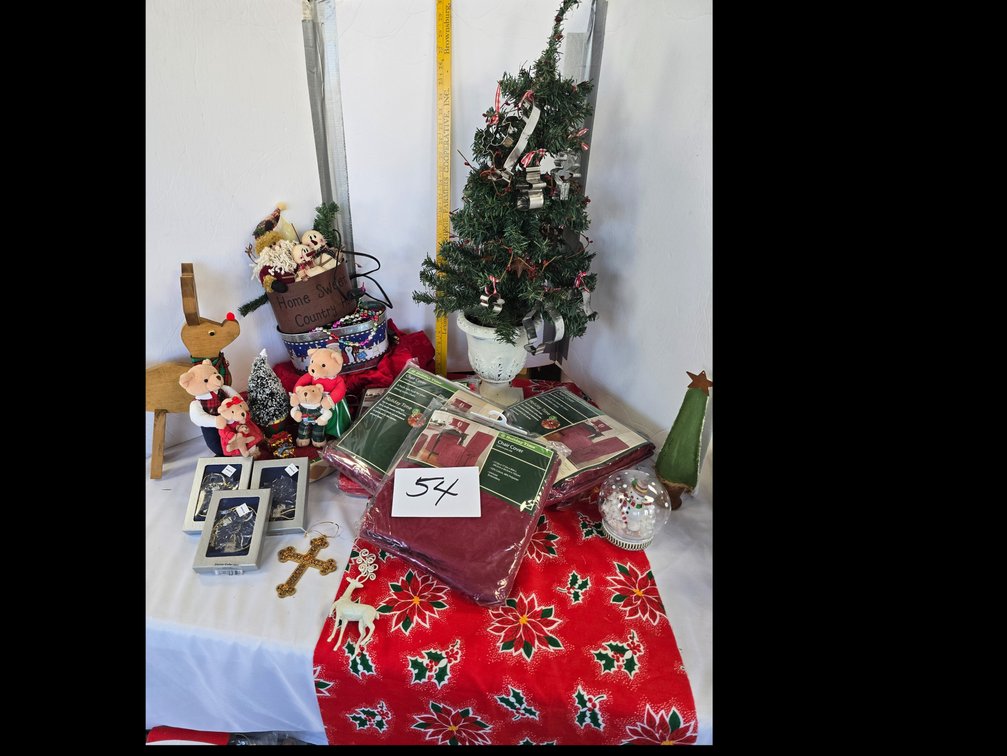 Musical bears, kitchen tree with cookie cutter ornaments, six new chair covers and two opened chair covers. Mikasa ornaments(3) retail for $10.06 each! 