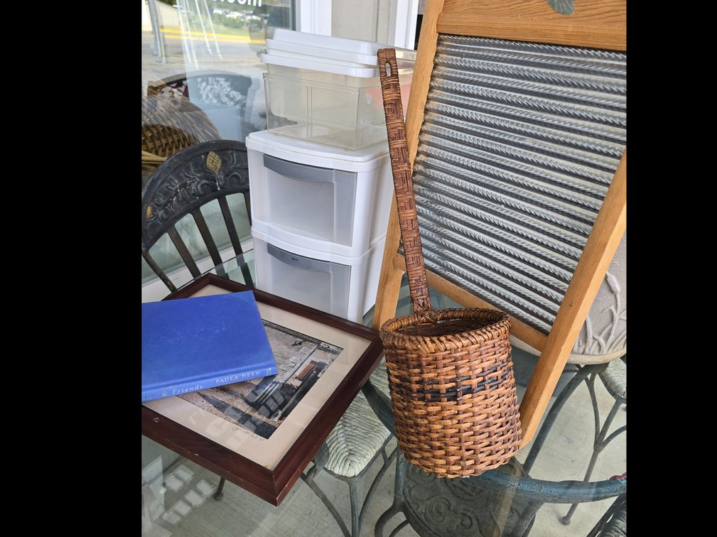 Dashboard, Paula Dean cook book, plastic storage boxes, 