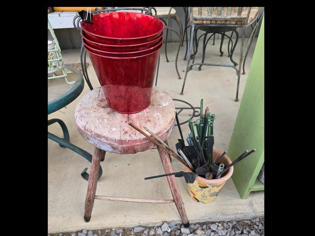 Wooden stool with plant tools