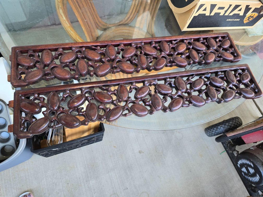 Pair of wooden oriental plant climbers