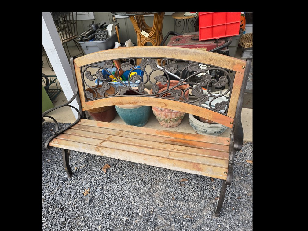 Iron and wood park bench