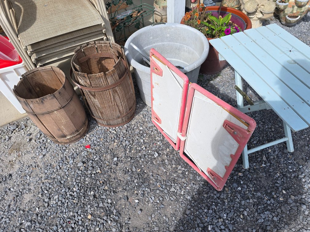 2 barrels, plastic lg. Water bucket, beach table, folding side tabke