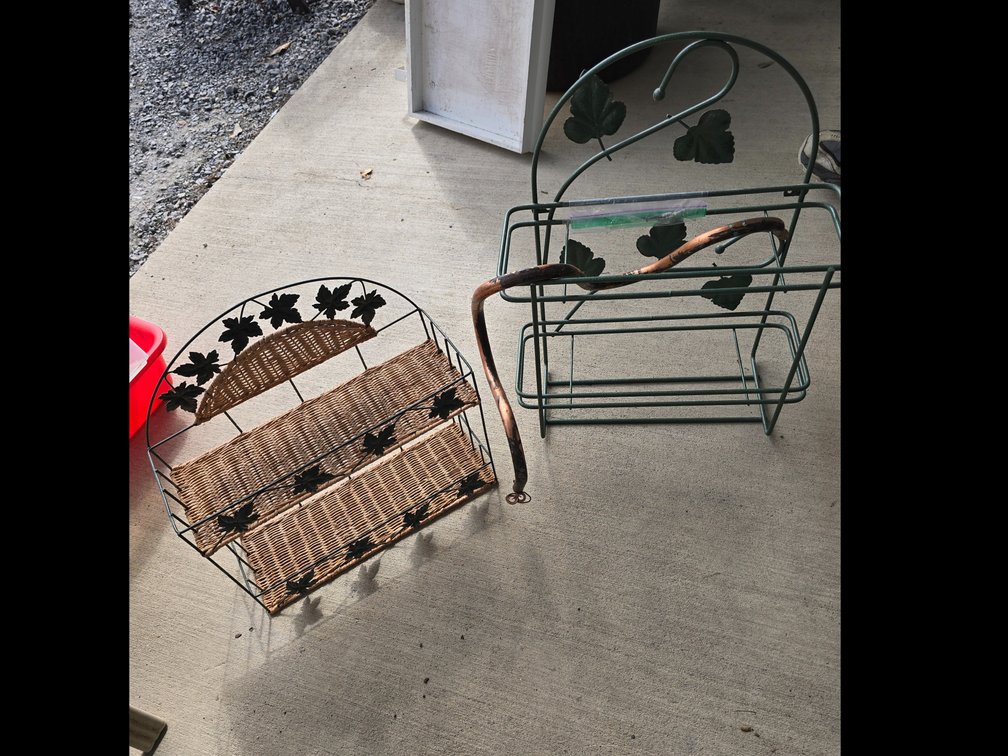 2 nice iron and wicker shelving units