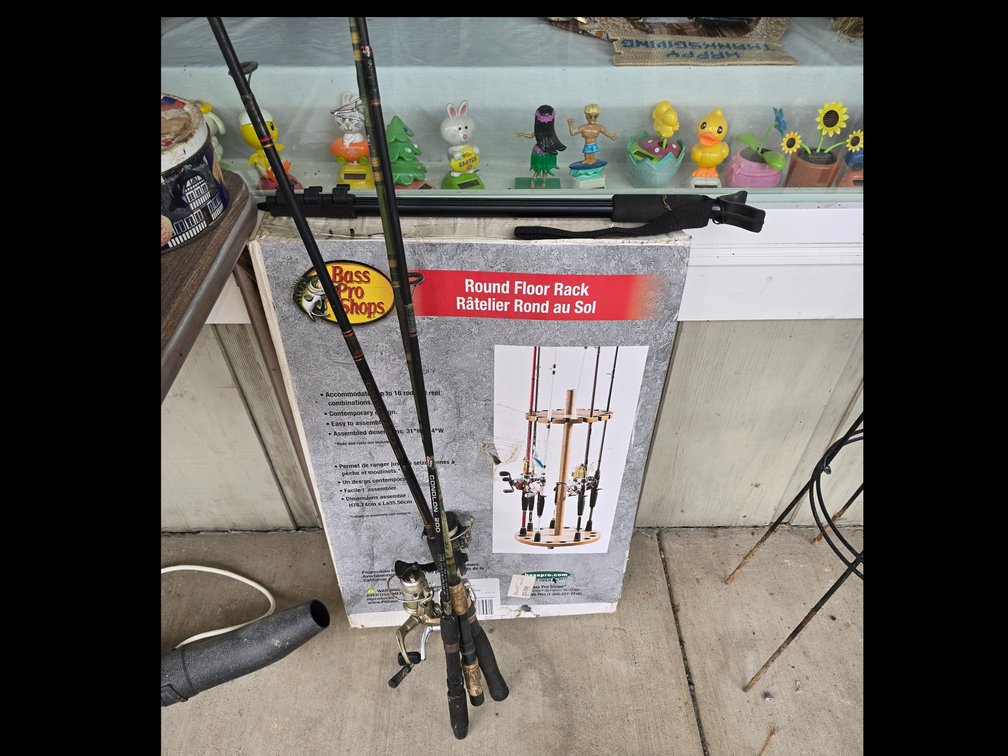 3 fishing g poles, NIB fishing stand and shooters pole