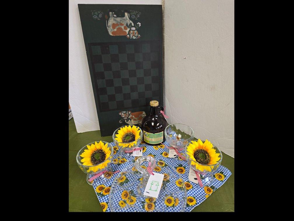 Wooden checkerboard, primitive painted kitchen glassware, and a little brown jug