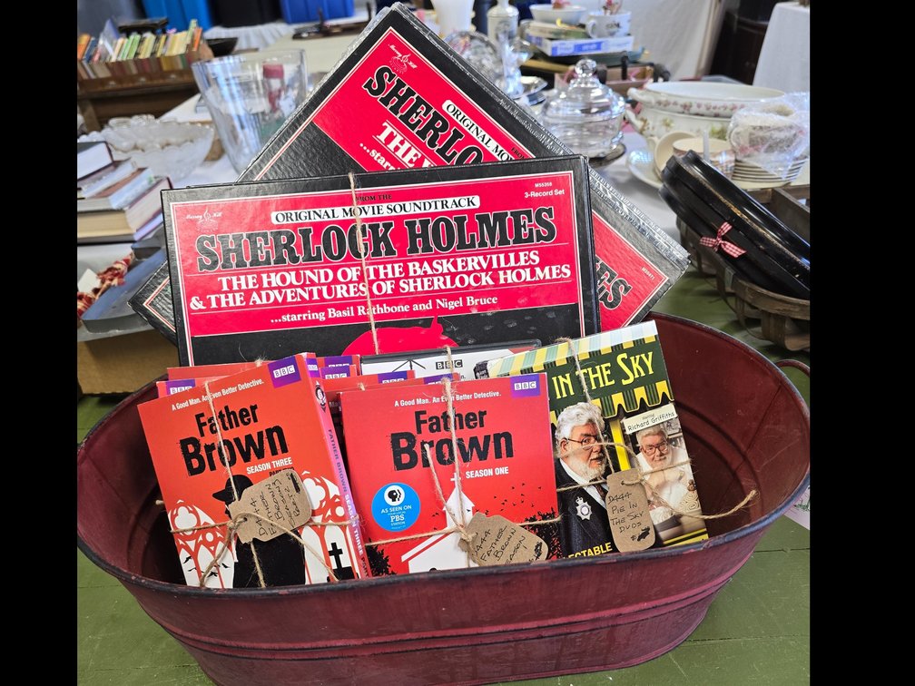 Red tin planter with Father Brown abd Sherlock Holmes record sets