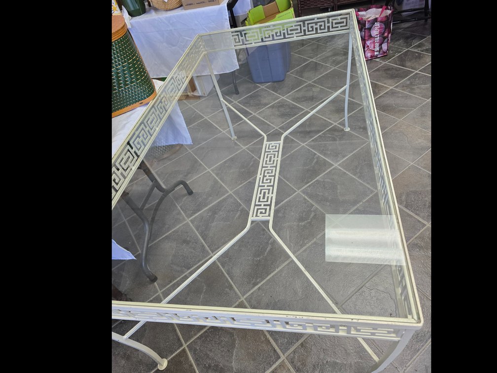 Wrought iron glass top table very nice