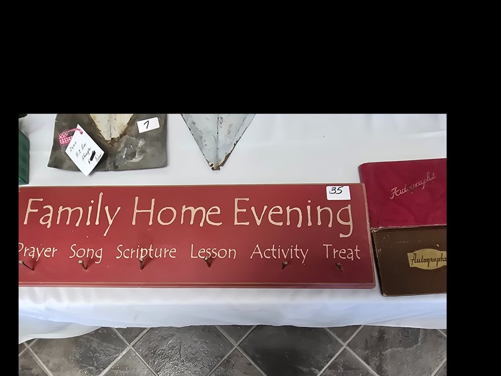 Wooden sign and two vintage autograph books