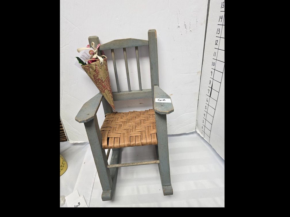 Dolls wooden rocker with Christmas ornament.  