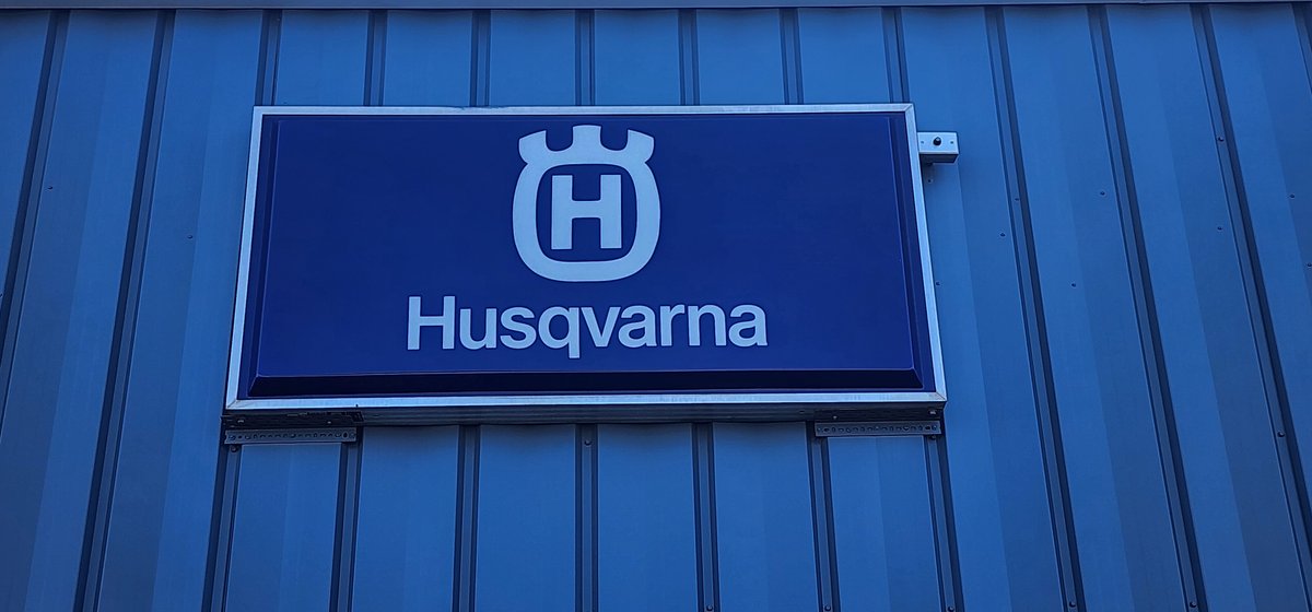 Sign- Husqvarna lighted sign