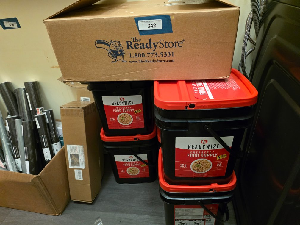 Ready-wise food emergency supply buckets and cans of whole wheat flour