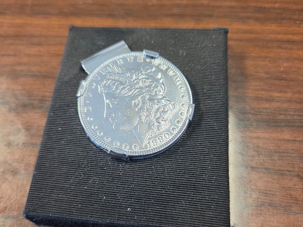 1880 Morgan Silver dollar attached to Silver award
