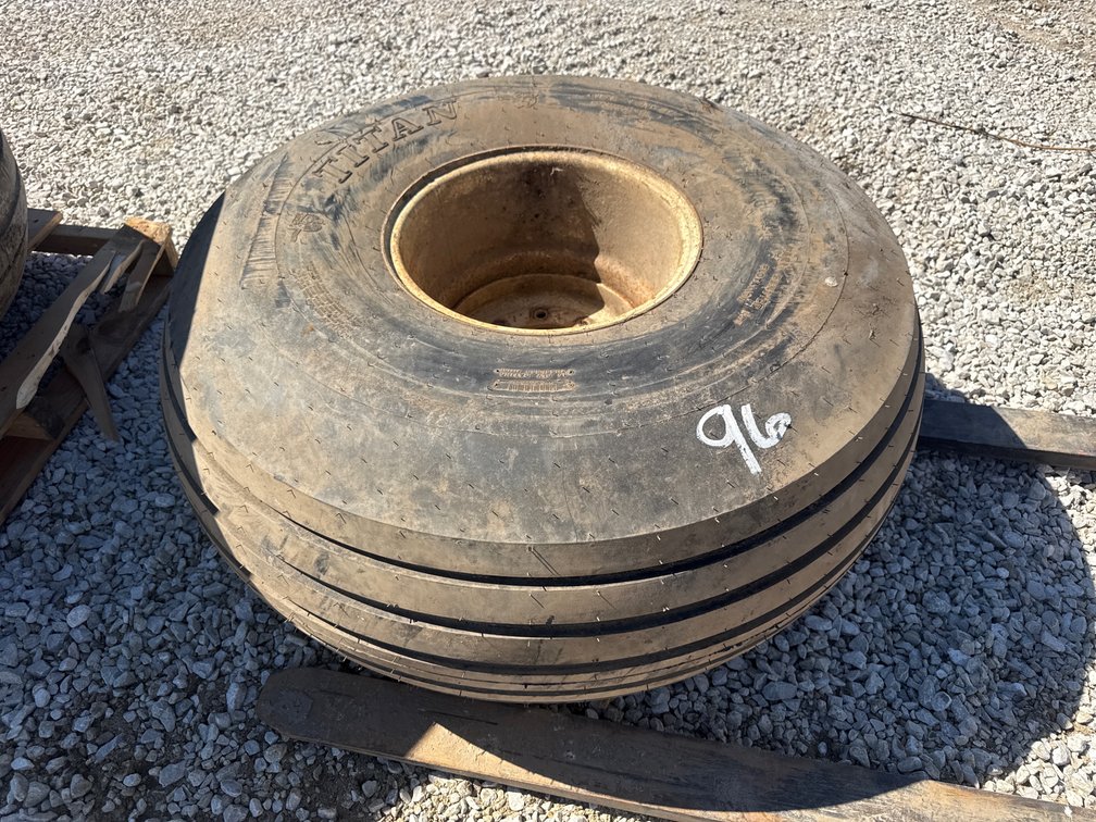 Titan 19L-16.1 tire and rim