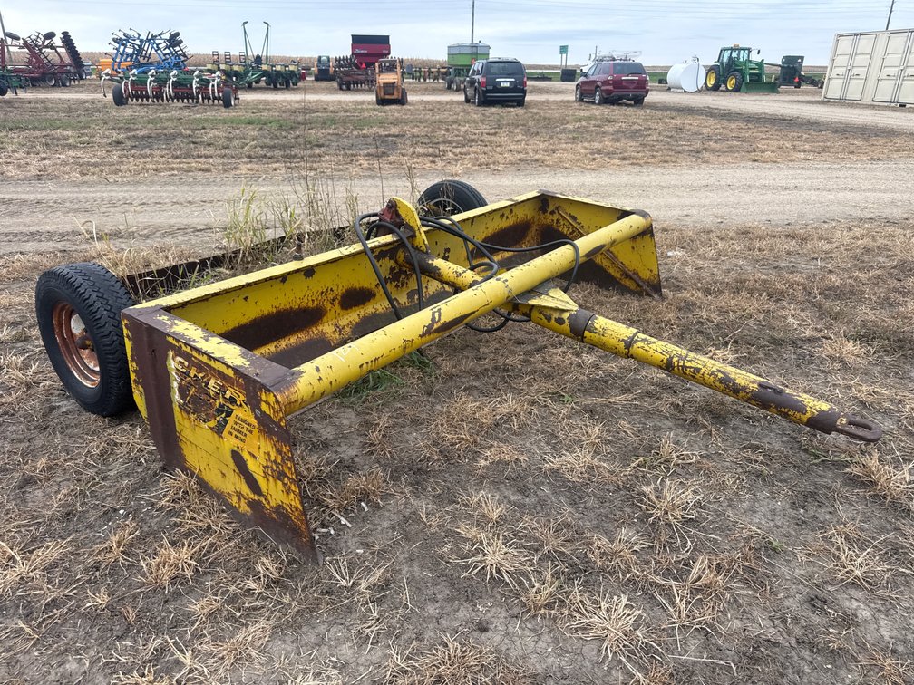 Tucker box scraper