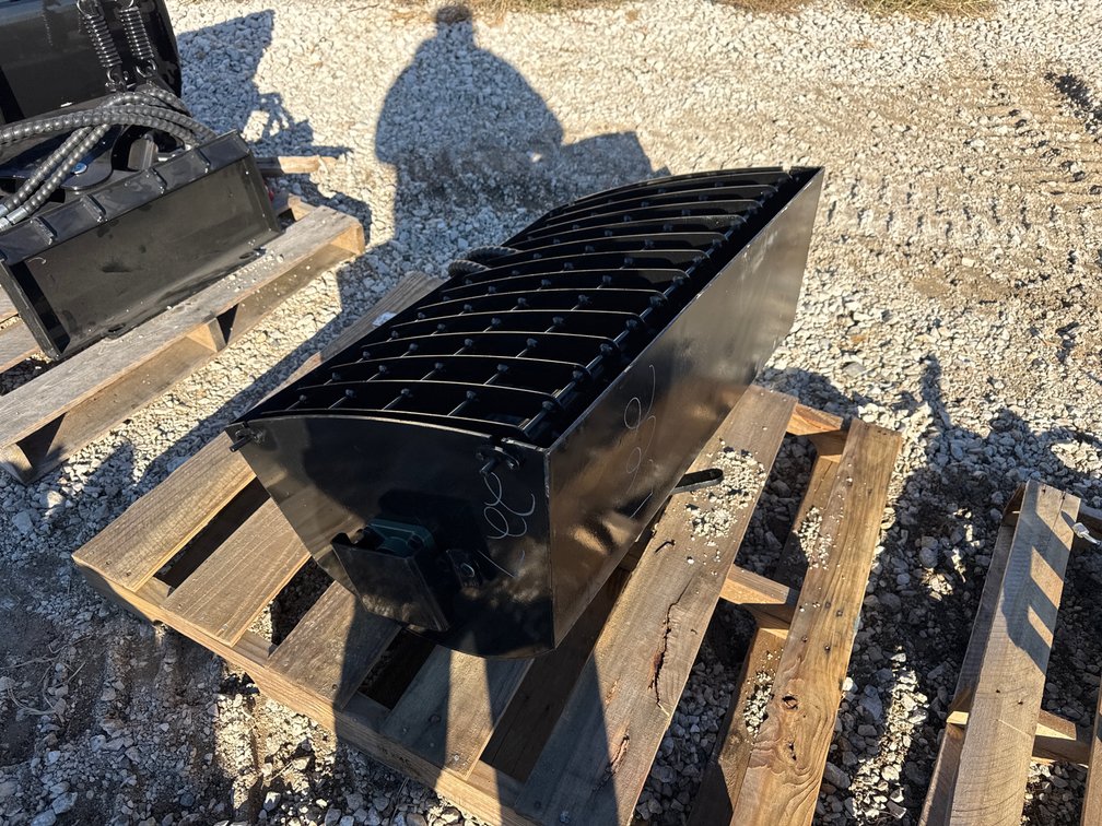 Mini skidloader concrete bucket.