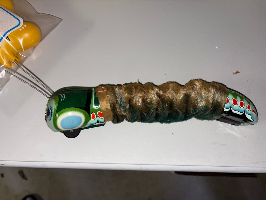 Zone 2-G- Tin Litho Caterpillar Toy