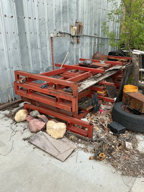 Red Metal Racks & Propane Bottle